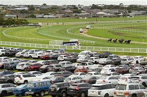 WARRNAMBOOL, AUSTRALIA - MAY 04: A general view of The Standard 3YO BM70 Handicap in front of the car park during Grand Annual Day at Warrnambool Racing Club on May 04, 2023 in Warrnambool, Australia. (Photo by Morgan Hancock/Getty Images)