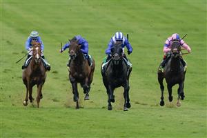 NEWMARKET, ENGLAND - MAY 05: Jim Crowley riding Mutasaabeq (blue/white cap) win The bet365 Mile at Newmarket Racecourse on May 05, 2023 in Newmarket, England. (Photo by Alan Crowhurst/Getty Images)