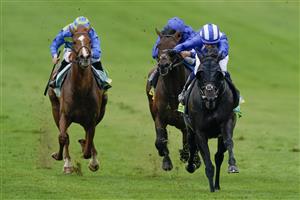 NEWMARKET, ENGLAND - MAY 05: Jim Crowley riding Mutasaabeq (blue/white cap) win The bet365 Mile at Newmarket Racecourse on May 05, 2023 in Newmarket, England. (Photo by Alan Crowhurst/Getty Images)