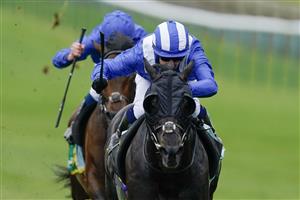 NEWMARKET, ENGLAND - MAY 05: Jim Crowley riding Mutasaabeq (blue/white cap) win The bet365 Mile at Newmarket Racecourse on May 05, 2023 in Newmarket, England. (Photo by Alan Crowhurst/Getty Images)