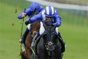 NEWMARKET, ENGLAND - MAY 05: Jim Crowley riding Mutasaabeq (blue/white cap) win The bet365 Mile at Newmarket Racecourse on May 05, 2023 in Newmarket, England. (Photo by Alan Crowhurst/Getty Images)