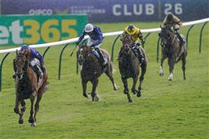 NEWMARKET, ENGLAND - MAY 05: William Buick riding Hurricane Lane (L) win The Jockey Club Stakes at Newmarket Racecourse on May 05, 2023 in Newmarket, England. (Photo by Alan Crowhurst/Getty Images)