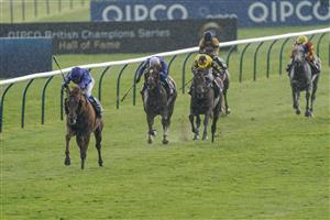 NEWMARKET, ENGLAND - MAY 05: William Buick riding Hurricane Lane (L) win The Jockey Club Stakes at Newmarket Racecourse on May 05, 2023 in Newmarket, England. (Photo by Alan Crowhurst/Getty Images)