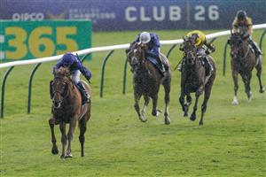 NEWMARKET, ENGLAND - MAY 05: William Buick riding Hurricane Lane (L) win The Jockey Club Stakes at Newmarket Racecourse on May 05, 2023 in Newmarket, England. (Photo by Alan Crowhurst/Getty Images)