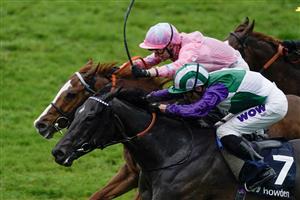 NEWMARKET, ENGLAND - MAY 06: Kieren Shoemark riding Vadream (green) win The Howden Palace House Stakes at Newmarket Racecourse on May 06, 2023 in Newmarket, England. (Photo by Alan Crowhurst/Getty Images)