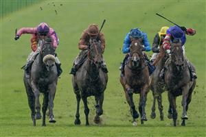 NEWMARKET, ENGLAND - MAY 06: Paul Mulrennan riding Azure Blur (L, pink) win The Howden British EBF Ellen Chaloner Stakes at Newmarket Racecourse on May 06, 2023 in Newmarket, England. (Photo by Alan Crowhurst/Getty Images)