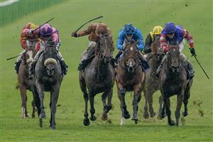 NEWMARKET, ENGLAND - MAY 06: Paul Mulrennan riding Azure Blur (L, pink) win The Howden British EBF Ellen Chaloner Stakes at Newmarket Racecourse on May 06, 2023 in Newmarket, England. (Photo by Alan Crowhurst/Getty Images)