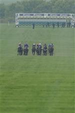 NEWMARKET, ENGLAND - MAY 06: A general view as runners make their way down the course during The Howden Suffolk Stakes at Newmarket Racecourse on May 06, 2023 in Newmarket, England. (Photo by Alan Crowhurst/Getty Images)