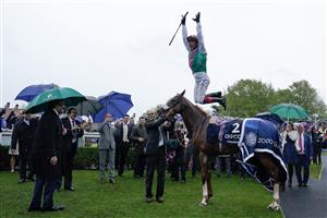 NEWMARKET, ENGLAND - MAY 06: Frankie Dettori returns to the winners enclosure after riding Chaldean to win The Qipco 2000 Guineas Stakes at Newmarket Racecourse on May 06, 2023 in Newmarket, England. (Photo by Alan Crowhurst/Getty Images)
