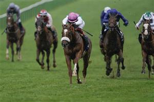 NEWMARKET, ENGLAND - MAY 06: Frankie Dettori riding Chaldean (pink cap) win The Qipco 2000 Guineas Stakes at Newmarket Racecourse on May 06, 2023 in Newmarket, England. (Photo by Alan Crowhurst/Getty Images)