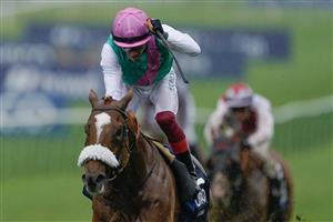 NEWMARKET, ENGLAND - MAY 06: Frankie Dettori riding Chaldean win The Qipco 2000 Guineas Stakes at Newmarket Racecourse on May 06, 2023 in Newmarket, England. (Photo by Alan Crowhurst/Getty Images)