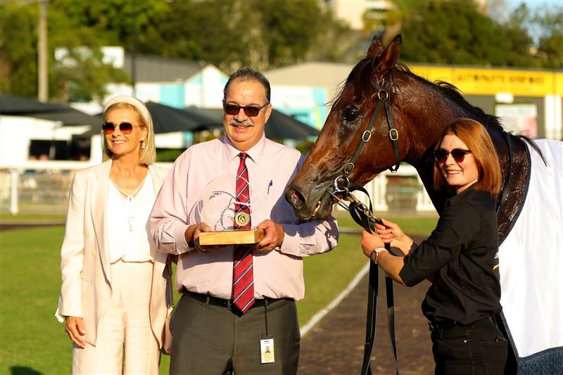 GOSFORD, AUSTRALIA - MAY 06: Trainer John Sargent (c) poses with a trophy after winning Race 8 The Coast with Kerrin McEvoy riding Palmetto during "Gosford Gold Cup" - Sydney Racing at Gosford Racecourse on May 06, 2023 in Gosford, Australia. (Photo by Jeremy Ng/Getty Images)