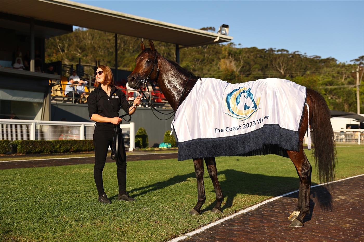 GOSFORD, AUSTRALIA - MAY 06: The strapper for Kerrin Mcevoy riding HHH Palmetto  is seen Race 8 The Coast during "Gosford Gold Cup" - Sydney Racing at Gosford Racecourse on May 06, 2023 in Gosford, Australia. (Photo by Jeremy Ng/Getty Images)