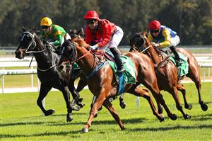 GOSFORD, AUSTRALIA - MAY 06:  Jenny Duggan riding Remlaps Commander wins Race 2 TAB Highway during "Gosford Gold Cup" - Sydney Racing at Gosford Racecourse on May 06, 2023 in Gosford, Australia. (Photo by Jeremy Ng/Getty Images)