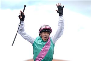 CHESTER, ENGLAND - MAY 10: Frankie Dettori leaps from his mount after riding Arrest to win The Boodles Chester Vase Stakes at Chester Racecourse on May 10, 2023 in Chester, England. (Photo by Alan Crowhurst/Getty Images)