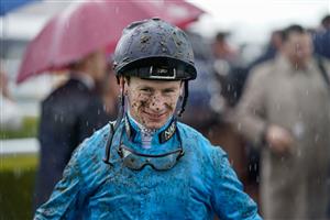 CHESTER, ENGLAND - MAY 10: A wet and muddy Oisin Murphy at Chester Racecourse on May 10, 2023 in Chester, England. (Photo by Alan Crowhurst/Getty Images)