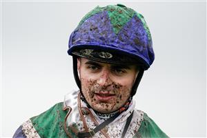 CHESTER, ENGLAND - MAY 10: A muddy Andrea Atzeni at Chester Racecourse on May 10, 2023 in Chester, England. (Photo by Alan Crowhurst/Getty Images)