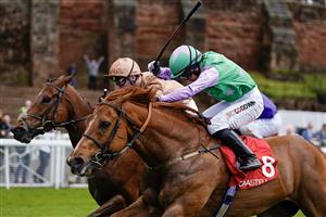 CHESTER, ENGLAND - MAY 11: Oisin Murphy riding Nymphadora (L, bronze) win The CAA Stellar Handicap at Chester Racecourse on May 11, 2023 in Chester, England. (Photo by Alan Crowhurst/Getty Images)