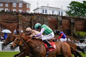 CHESTER, ENGLAND - MAY 11: Oisin Murphy riding Nymphadora (L, bronze) win The CAA Stellar Handicap at Chester Racecourse on May 11, 2023 in Chester, England. (Photo by Alan Crowhurst/Getty Images)