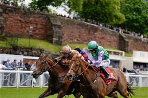 CHESTER, ENGLAND - MAY 11: Oisin Murphy riding Nymphadora (L, bronze) win The CAA Stellar Handicap at Chester Racecourse on May 11, 2023 in Chester, England. (Photo by Alan Crowhurst/Getty Images)