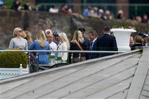 CHESTER, ENGLAND - MAY 11: Racegoers enjoying the view at Chester Racecourse on May 11, 2023 in Chester, England. (Photo by Alan Crowhurst/Getty Images)