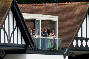 CHESTER, ENGLAND - MAY 11: Racegoers enjoying the view at Chester Racecourse on May 11, 2023 in Chester, England. (Photo by Alan Crowhurst/Getty Images)