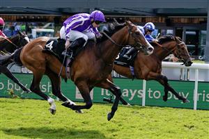 CHESTER, ENGLAND - MAY 12: Ryan Moore riding Point Lonsdale (L, purple) win The Ire-Incentive, It Pays To Buy Irish Huxley Stakes from Jim Crowley and Mujtaba (R, blue) at Chester Racecourse on May 12, 2023 in Chester, England. (Photo by Alan Crowhurst/Getty Images)
