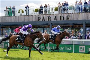 CHESTER, ENGLAND - MAY 12: Ryan Moore riding Point Lonsdale (L, purple) win The Ire-Incentive, It Pays To Buy Irish Huxley Stakes from Jim Crowley and Mujtaba (R, blue) at Chester Racecourse on May 12, 2023 in Chester, England. (Photo by Alan Crowhurst/Getty Images)