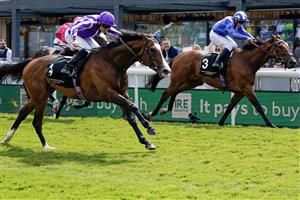 CHESTER, ENGLAND - MAY 12: Ryan Moore riding Point Lonsdale (L, purple) win The Ire-Incentive, It Pays To Buy Irish Huxley Stakes from Jim Crowley and Mujtaba (R, blue) at Chester Racecourse on May 12, 2023 in Chester, England. (Photo by Alan Crowhurst/Getty Images)