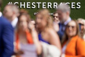 CHESTER, ENGLAND - MAY 12: Racegoers arrive at Chester Racecourse on May 12, 2023 in Chester, England. (Photo by Alan Crowhurst/Getty Images)