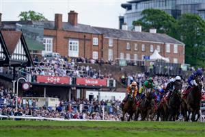 CHESTER, ENGLAND - MAY 12: Saffie Osborne riding Metier (L, orange) on their way to winning The tote Chester Cup at Chester Racecourse on May 12, 2023 in Chester, England. (Photo by Alan Crowhurst/Getty Images)