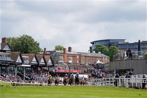 CHESTER, ENGLAND - MAY 12: Runners ease down after finishing The CAA Stellar Earl Grosvenor Handicap at Chester Racecourse on May 12, 2023 in Chester, England. (Photo by Alan Crowhurst/Getty Images)