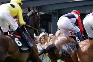 CHESTER, ENGLAND - MAY 12: Racegoers get a close view of the action as runners pass during The Ire-Incentive, It Pays To Buy Irish Huxley Stakes at Chester Racecourse on May 12, 2023 in Chester, England. (Photo by Alan Crowhurst/Getty Images)