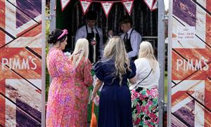 CHESTER, ENGLAND - MAY 12: Socialising at Chester Racecourse on May 12, 2023 in Chester, England. (Photo by Alan Crowhurst/Getty Images)