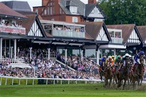 CHESTER, ENGLAND - MAY 12: Saffie Osborne riding Metier (L, orange) on their way to winning The tote Chester Cup at Chester Racecourse on May 12, 2023 in Chester, England. (Photo by Alan Crowhurst/Getty Images)