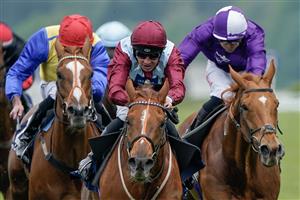 ASCOT, ENGLAND - MAY 13: Charles Bishop riding Sheer Rocks (maroon, light blue) at Ascot Racecourse on May 13, 2023 in Ascot, England. (Photo by Alan Crowhurst/Getty Images)