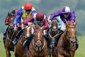 ASCOT, ENGLAND - MAY 13: Charles Bishop riding Sheer Rocks (maroon, light blue) at Ascot Racecourse on May 13, 2023 in Ascot, England. (Photo by Alan Crowhurst/Getty Images)
