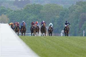 ASCOT, ENGLAND - MAY 13: Charles Bishop riding Sheer Rocks (L, maroon, light blue) at Ascot Racecourse on May 13, 2023 in Ascot, England. (Photo by Alan Crowhurst/Getty Images)