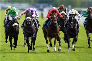 YORK, ENGLAND - MAY 17: Paul Mulrennan riding Azure Blue (purple/pink) win The 1895 Duke Of York Clipper Stakes at York Racecourse on May 17, 2023 in York, England. (Photo by Alan Crowhurst/Getty Images)