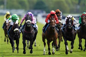 YORK, ENGLAND - MAY 17: Paul Mulrennan riding Azure Blue (purple/pink) win The 1895 Duke Of York Clipper Stakes at York Racecourse on May 17, 2023 in York, England. (Photo by Alan Crowhurst/Getty Images)