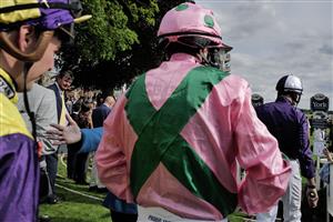 YORK, ENGLAND - MAY 17: Jockeys enter the parade ring at York Racecourse on May 17, 2023 in York, England. (Photo by Alan Crowhurst/Getty Images)