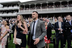 YORK, ENGLAND - MAY 18: Racegoers watch the big screen as the race nears its end at York Racecourse on May 18, 2023 in York, England. (Photo by Alan Crowhurst/Getty Images)