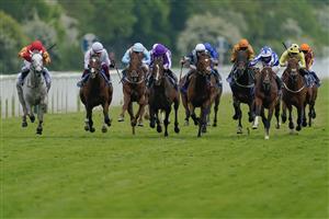 YORK, ENGLAND - MAY 18: Oisin Murphy riding The Foxes (R, blue/white) win The Al Basti Equiworld Dubai Dante Stakes at York Racecourse on May 18, 2023 in York, England. (Photo by Alan Crowhurst/Getty Images)
