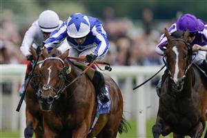 YORK, ENGLAND - MAY 18: Oisin Murphy riding The Foxes (blue) win The Al Basti Equiworld Dubai Dante Stakes at York Racecourse on May 18, 2023 in York, England. (Photo by Alan Crowhurst/Getty Images)