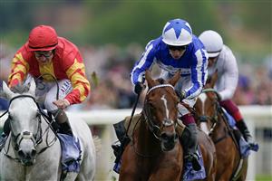 YORK, ENGLAND - MAY 18: Oisin Murphy riding The Foxes (blue) win The Al Basti Equiworld Dubai Dante Stakes at York Racecourse on May 18, 2023 in York, England. (Photo by Alan Crowhurst/Getty Images)