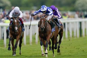 YORK, ENGLAND - MAY 18: Oisin Murphy riding The Foxes (blue) win The Al Basti Equiworld Dubai Dante Stakes at York Racecourse on May 18, 2023 in York, England. (Photo by Alan Crowhurst/Getty Images)