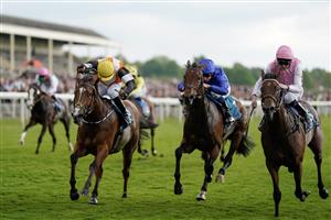 YORK, ENGLAND - MAY 19: Ronan Whelan riding Sounds Of Heaven (L, yellow cap) win The Oaks Farm Stables Fillies' Stakes at York Racecourse on May 19, 2023 in York, England. (Photo by Alan Crowhurst/Getty Images)