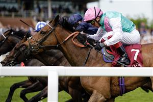 NEWBURY, ENGLAND - MAY 20: Frankie Dettori riding Haskoy (pink cap) win The Al Rayyan Stakes at Newbury Racecourse on May 20, 2023 in Newbury, England. (Photo by Alan Crowhurst/Getty Images)