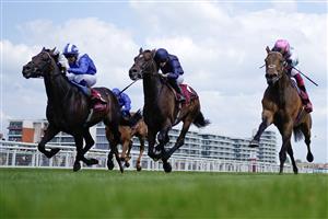 NEWBURY, ENGLAND - MAY 20: Frankie Dettori riding Haskoy (R, pink cap) win The Al Rayyan Stakes at Newbury Racecourse on May 20, 2023 in Newbury, England. (Photo by Alan Crowhurst/Getty Images)