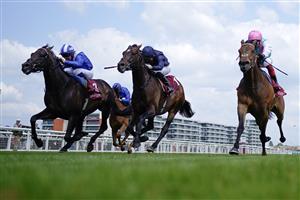 NEWBURY, ENGLAND - MAY 20: Frankie Dettori riding Haskoy (R, pink cap) win The Al Rayyan Stakes at Newbury Racecourse on May 20, 2023 in Newbury, England. (Photo by Alan Crowhurst/Getty Images)